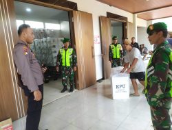 Anggota TNI-Polri Kawal Pergeseran Kotak Suara Pemilu Dari PPK ke Kantor KPU Kabupaten Madiun.